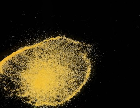 Photo for Small size yellow Sand flying explosion, gold cheese sands grain wave explode. Abstract cloud fly. Yellow colored sand splash throwing in Air. black background Isolated high speed shutter, throwing - Royalty Free Image