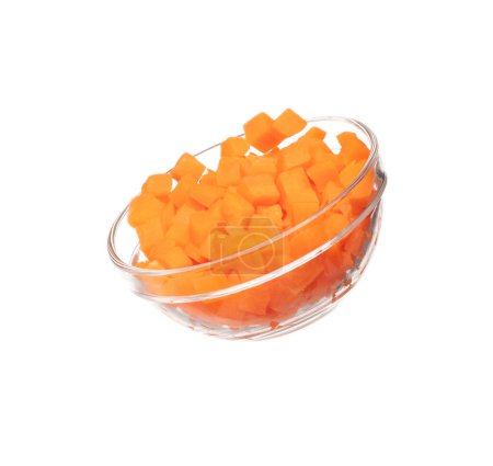 Téléchargez les photos : Carrot fresh fly float in glass bowl in Air turn to dice cube shape. Beta Carotene orange color in Carrot is good health. Many Dice cube carrot flying throw up in Air. White background isolated - en image libre de droit