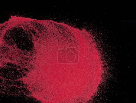Photo for Small size red Sand flying explosion, blood sands grain wave explode. Abstract cloud fly. Red colored sand splash throwing in Air. black background Isolated high speed shutter, throwing freeze stop - Royalty Free Image