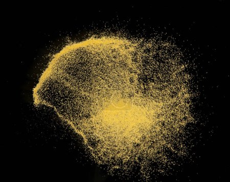 Foto de Small size yellow Sand flying explosion, gold cheese sands grain wave explode. Abstract cloud fly. Yellow colored sand splash throwing in Air. black background Isolated high speed shutter, throwing - Imagen libre de derechos
