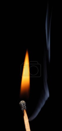 Photo for Match flame over black background, close up Macro fire burning on matchstick. Wooden matches with red sulfur heads, fire ignition match. Idea spark as leadership bring fire to team - Royalty Free Image