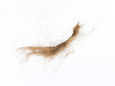 Photo for Sand flying explosion, Golden sand wave explode. Abstract sands cloud fly. Yellow colored sand splash throwing in Air. White background Isolated high speed shutter, throwing freeze stop motion - Royalty Free Image