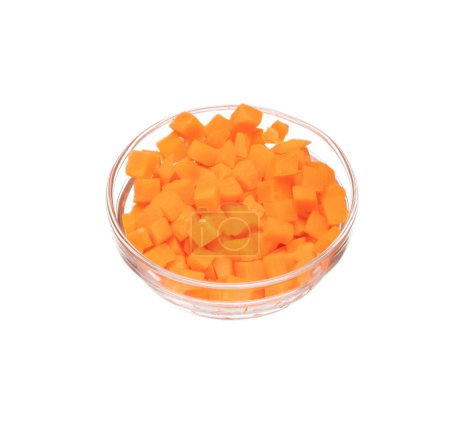 Foto de Carrot fresh fly float in glass bowl in Air turn to dice cube shape. Beta Carotene orange color in Carrot is good health. Many Dice cube carrot flying throw up in Air. White background isolated - Imagen libre de derechos