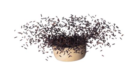 Foto de Riceberry rice explosion flying wooden bowl, black purple berry grain wave floating, fall down in air. Rice Berry is organic healthy food. White background Isolated high speed shutter, freeze stop - Imagen libre de derechos