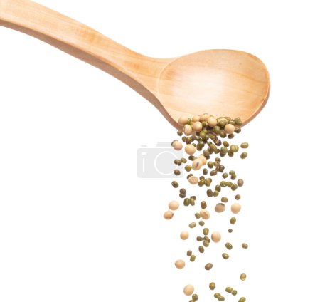 Photo for Mix green mung soy beans fall down explosion, several kind bean float pouring in wooden spoon. Dried soybean green mung mixed beans splash throwing in Air. White background Isolated high speed shutter - Royalty Free Image