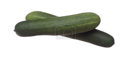 Téléchargez les photos : Cucumber fly in mid air, green fresh vegetable cucumber falling. Organic fresh vegetable with eaten leaf of long cucumber, close up texture. White background isolated freeze motion high speed shutter - en image libre de droit