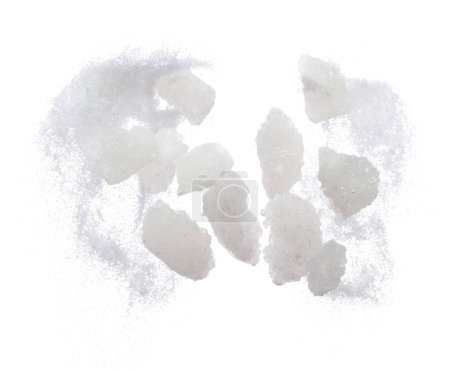 Photo for Rock Sugar mix refined ground dust fly explosion, white crystal Rock Sugar abstract cloud floating. Big Rock Sugar splash throwing in air. white background isolated high speed freeze motion - Royalty Free Image