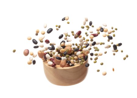 Photo for Mix beans fall down explosion, several kind bean float explode in wooden bowl. Dried white green red soy black peanut mixed beans splash throwing in Air. White background Isolated high speed shutter - Royalty Free Image