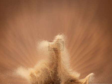 Photo for Small Fine size Sand flying explosion, Golden grain wave explode, abstract cloud fly. Yellow colored sand splash throwing in Air. Aura wallpaper background high speed shutter, freeze stop motion - Royalty Free Image