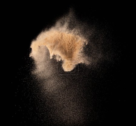 Photo for Small size fine Sand flying explosion, Golden grain wave explode. Abstract cloud fly. Yellow colored sand splash silica in Air. Element Black background Isolated high speed throwing freeze shot - Royalty Free Image