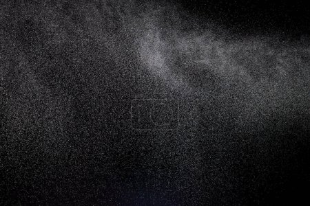 Photo for Million of Star Dust, Photo image of falling down shower rain snow, heavy snows storm flying. Freeze shot on black background isolated overlay. Spray water fog smoke as star particle on wind - Royalty Free Image
