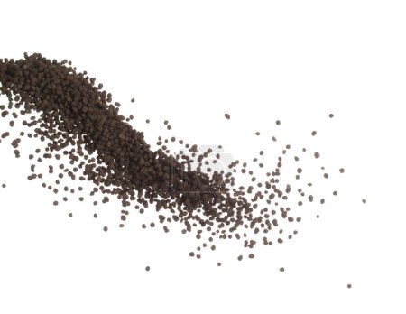 Foto de Fertilizante químico marrón acelerar la explosión caída de la mosca de crecimiento, muchos fertilizante bola diminuta para la plantación de tiro de flotador en el aire. Fondo blanco aislado movimiento de congelación de alta velocidad - Imagen libre de derechos