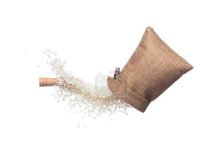 Téléchargez les photos : Japanese Rice in sack bag flying explosion, white grain rices fall abstract fly. Beautiful complete seed rice bag splash in air, food object design. White background isolated, high speed freeze motion - en image libre de droit