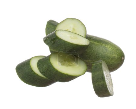 Photo for Cucumber fly fall, green fresh vegetable cucumber cut chop slice. Organic fresh vegetable with eaten leaf of long cucumber, close up texture. White background isolated freeze motion high speed shutter - Royalty Free Image
