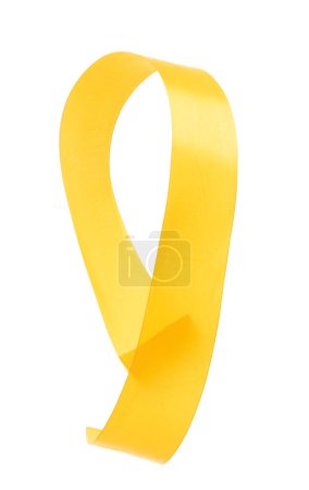 Photo for Yellow Gold ribbon long straight fly in air with curve roll shiny. Yellow Golden ribbon for present gift birthday party to wrap around decorate and make of textile cloth long straight. White background isolated - Royalty Free Image