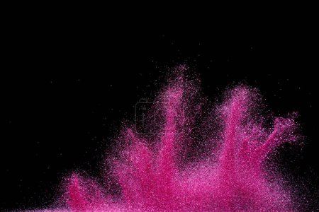 Photo for Explosion metallic pink glitter sparkle. Choky Glitter powder spark blink celebrate, blur foil explode in air, fly throw pink glitters particle. Black background isolated, selective focus Blur bokeh - Royalty Free Image