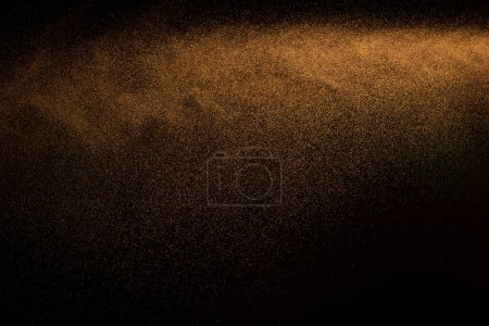 Téléchargez les photos : Million of Star Dust, Photo image of falling down shower rain snow, heavy snows storm flying. Freeze shot on black background isolated overlay. Golden light Spray water fog smoke as star particle - en image libre de droit