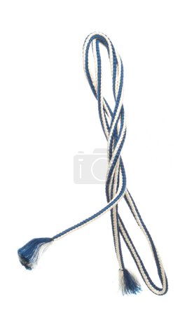 Photo for String rope obi Japanese Traditional Komono equipment fly in air with curve. String rope obi Japanese Traditional Komono fabric is beautiful clothes for ceremony event. White background isolated - Royalty Free Image