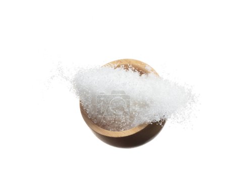 Foto de Pure refined Sugar in wooden bowl flying spinning, white crystal sugar fall abstract fly. Pure refined sugar swirl in air, food object design. white background isolated high speed freeze motion - Imagen libre de derechos