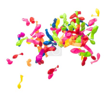 Photo for Deflated rubber colorful balloons fly in air. Many colorful deflated balloons in red, blue, yellow throw scatter. Toy for kid to play in birthday party and celebrate, white background isolated - Royalty Free Image