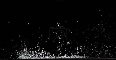 Photo for Shape form droplet of Water splashes into drop water attack fluttering in air. Splash Water for texture graphic resource elements, black background isolated series two of images - Royalty Free Image