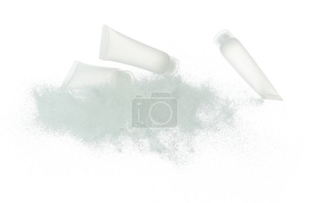 Photo for Cosmetic container white bottle fly splashing on white sand. Tube transparent sand powder in mid air. Moisturizer lotion cream bottle explosion flying. White background isolated high speed shutter - Royalty Free Image