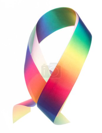 Photo for Rainbow ribbon long straight fly in air with curve roll shiny. Rainbow lgbt ribbon for present gift birthday party to wrap around decorate and make of textile cloth long straight. White background - Royalty Free Image