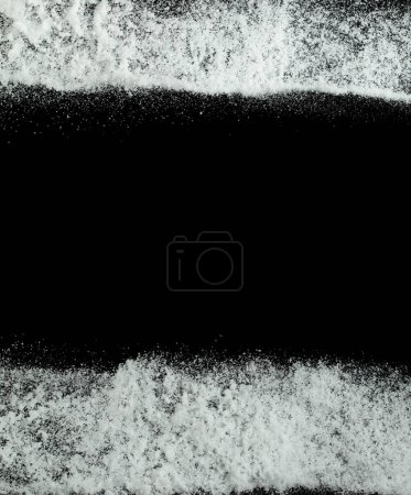 Photo for Heavy snow fall down from sky or roof, heavy big small size snows. Freeze shot on black background isolated overlay. Fluffy White snowflakes splash cloud in mid air. Real Snow throwing - Royalty Free Image