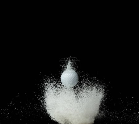 Photo for Golfer training practice in middle of snow night. Sport training golf ball falling down snow, heavy big small size snows. Freeze shot on black background isolated overlay. - Royalty Free Image