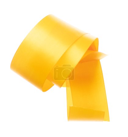 Photo for Yellow Gold ribbon long straight fly in air with curve roll shiny. Yellow Golden ribbon for present gift birthday party to wrap around decorate and make of long straight. White background isolated - Royalty Free Image