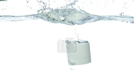 Photo for Cosmetic container fall into clear water with air bubble. Small cosmetic treatment container drop to clear water of freshness. White background isolated freeze element - Royalty Free Image