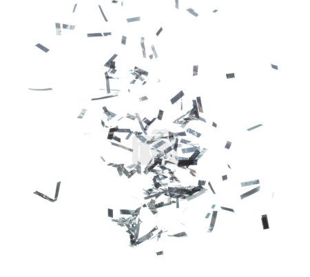 Foto de Silver Confetti Foil caída salpicaduras en el aire. Silver Confetti Foil explosion flying, abstract cloud fly. Muchos partido brillo scatter en muchos grupo. Fondo blanco aislado de alta velocidad obturador congelar el movimiento - Imagen libre de derechos