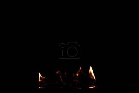 Photo for Fire Flames Blaze burn on black background isolated. Firing flaming on paper abstract texture. Fire burn on paper to ashes and create flame. Photo real high resolution blur out of focus - Royalty Free Image
