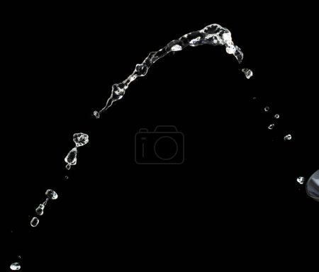 Photo for Shape form throw of Water splashes into Line water in air and stop motion freeze shot. Shape form Water for clear texture graphic resource elements, black background isolated - Royalty Free Image