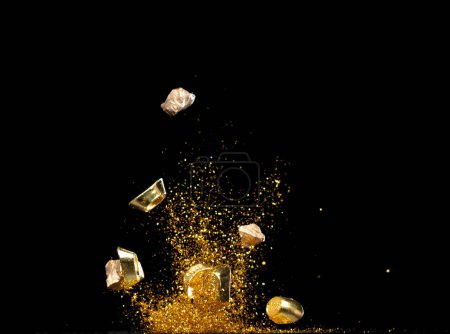 Photo for Gold Ingot Chinese Money bar token fly with dust particle in air. Chinese new year Yuanbao gold ingots floating to golden money sand particle. Language is wealthy prosperity. Black background isolated - Royalty Free Image