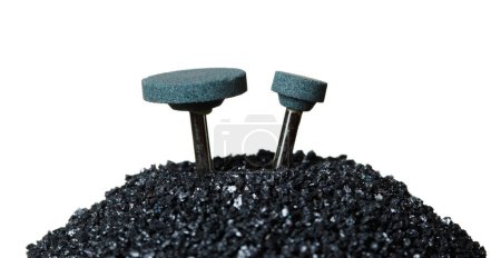Photo for Silicon Carbide show with sharpening tools device. Black Silicon Carbide pile and top with spinning tools to sharpening surface material, White background Isolated particle element object - Royalty Free Image