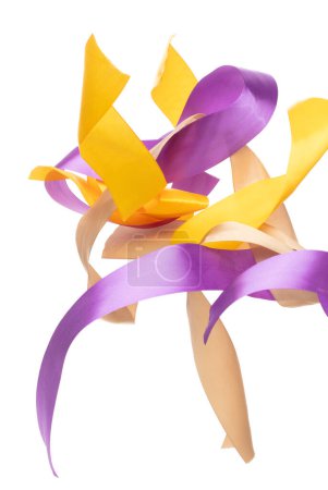 Photo for Yellow Gold Purple ribbon long straight fly in air with curve roll shiny. Yellow Golden Purple ribbon for present gift birthday party to wrap around decorate and make of textile cloth long straight. - Royalty Free Image