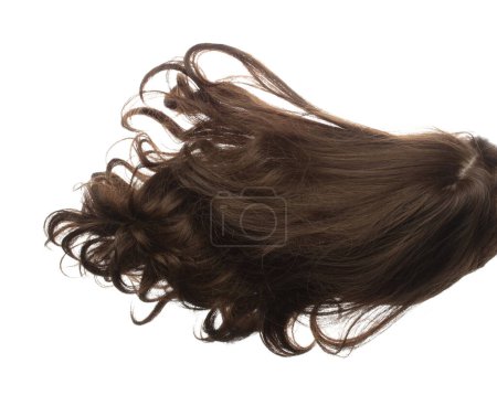 Photo for Curl Wig hair style fly fall explosion. Curly brunette woman wig hair float in mid air. Wave curl wig hair extension wind blow cloud throw. White background isolated high speed freeze motion - Royalty Free Image