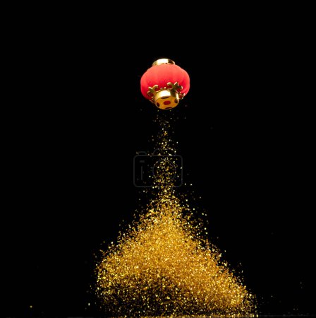 Foto de Gold Chinese Money lantern fly with dust particle in air. Chinese new year Yuanbao gold lantern floating to golden money sand particle. Language is wealthy prosperity. Black background isolated - Imagen libre de derechos