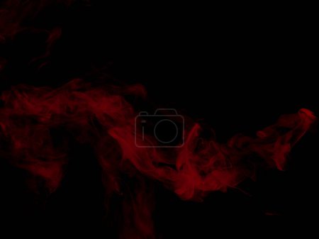 Foto de Red Dense Fluffy Puffs of White Smoke and Fog on black Background, Abstract Smoke Clouds, Movement Blurred out of focus. Fumar golpes de la máquina de hielo seco volar revoloteando en el aire, textura efecto - Imagen libre de derechos
