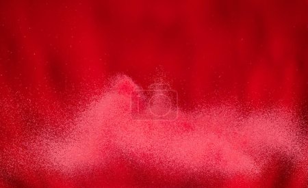 Foto de Small Fine size Sand flying explosion, Red Hot wave explode, abstract cloud fly. Red burn colored sand splash throwing Air. Volcano Lava wallpaper background high speed shutter, freeze stop motion - Imagen libre de derechos