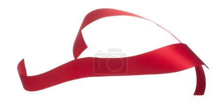 Photo for Red ribbon long straight fly in air with curve roll shiny. Red ribbon for present gift birthday party to wrap around decorate and make of textile cloth long straight. White background isolated - Royalty Free Image