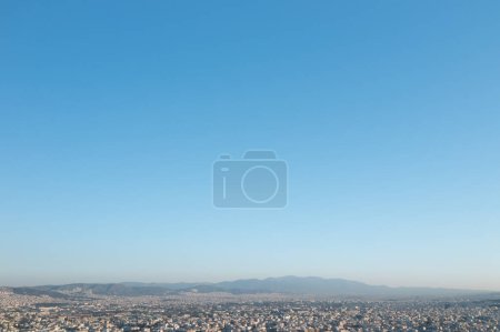Photo for Athens City Center Skyline: Urban Architecture under a Vast Blue Sky. High quality photo - Royalty Free Image