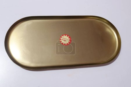 Photo for A closeup shot of a empty shiny tray on white background - Royalty Free Image