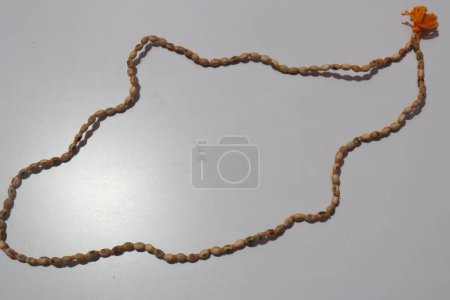 Photo for Tulsi mala or Prayer beads made from the seeds of the rudraksha tree - Royalty Free Image