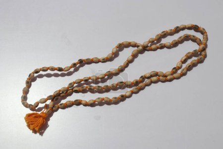Photo for Tulsi mala or Prayer beads made from the seeds of the rudraksha tree - Royalty Free Image