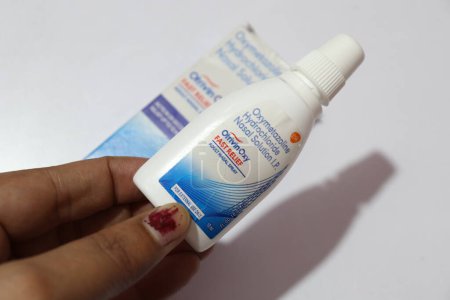 Photo for View of Otrivin Nasal spray in female hand - Royalty Free Image