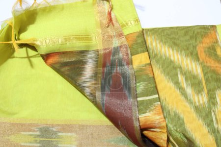 Photo for Traditional female Yellow Colour Handmade Work Saree Isolated on White Background - Royalty Free Image