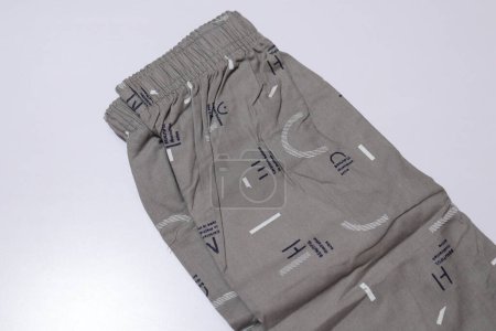 Foto de Pantalones cortos de salón de color gris masculino aislados sobre fondo blanco - Imagen libre de derechos