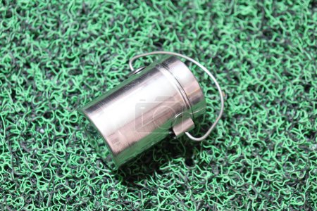 Photo for Round Small Aluminium Handi Isolated on green surface - Royalty Free Image